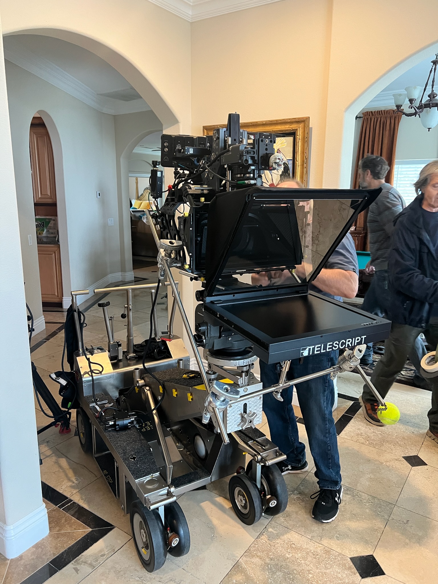 Telescript through-the-lens teleprompter mounted on a J.L. Fisher dolly inside an upscale home