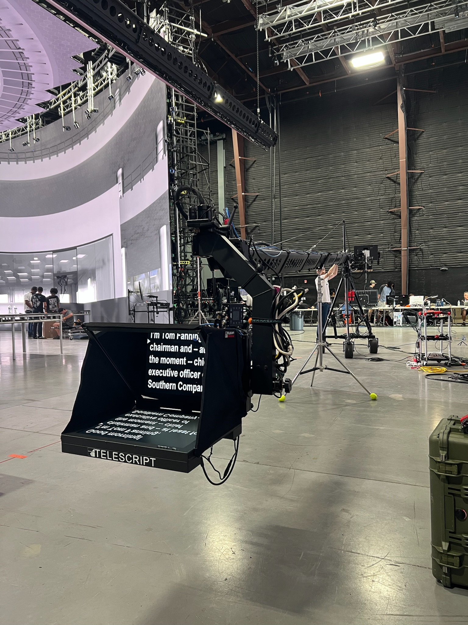 Telescript jib-mounted teleprompter on a large soundstage running a keynote script